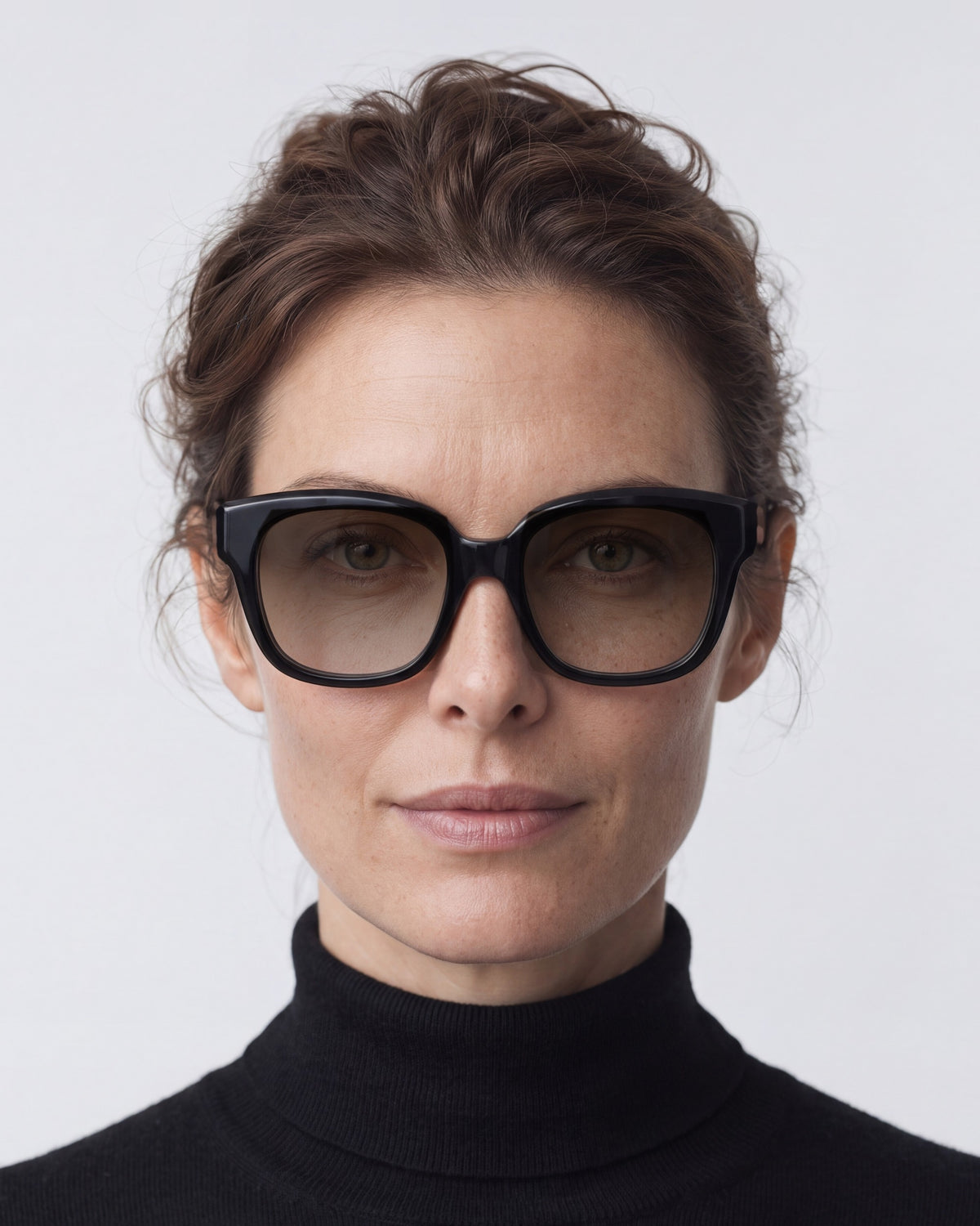 Chloe in black, worn, sun lenses
